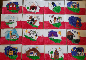 Wystawa prac plastycznych. Dzieci wykonały obrazki przedstawiające kontury Polski naklejone na tło biało - czerwonej flagi.